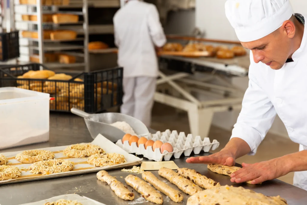 bakers preparing baked goods for their bakery business